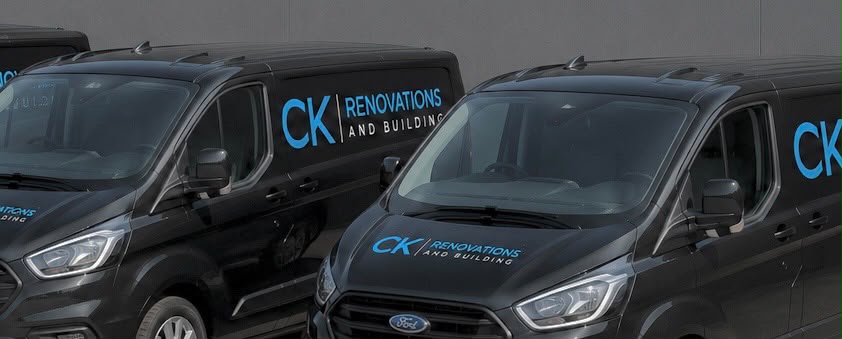 CK construction team reviewing plans on site